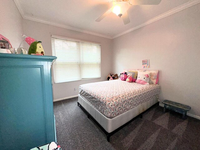 bedroom with crown molding, ceiling fan, dark colored carpet, and baseboards