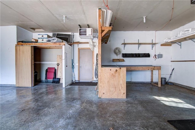 garage featuring a workshop area