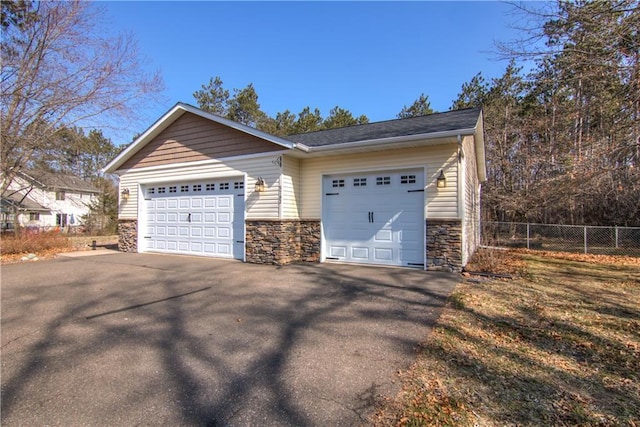 detached garage with fence