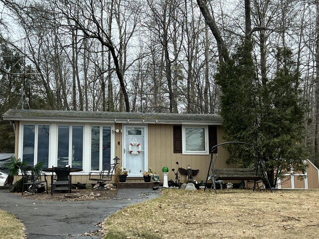 1487 Gunlock Shores Ln, Minocqua, WI 54548 - view of front of property with roof with shingles