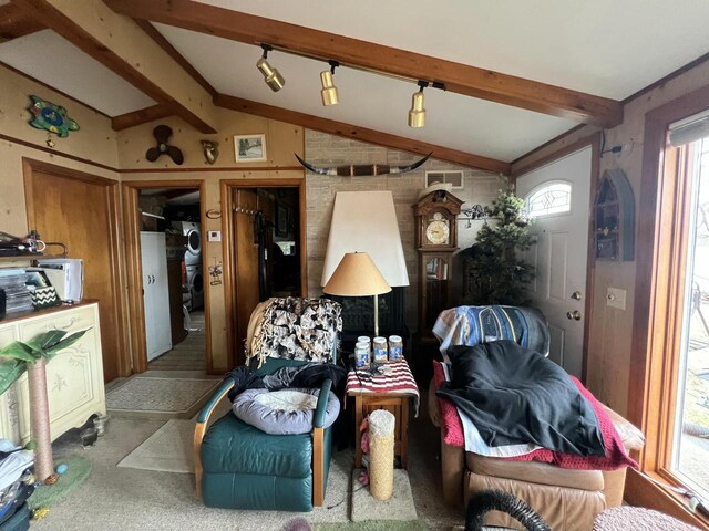1487 Gunlock Shores Ln, Minocqua, WI 54548 - living room featuring visible vents and lofted ceiling with beams