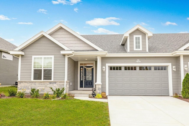 craftsman inspired home with stone siding, a front lawn, an attached garage, a shingled roof, and driveway