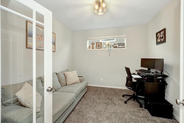 office space featuring baseboards and carpet floors