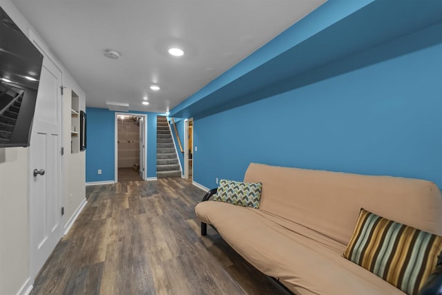 living area featuring recessed lighting, stairway, wood finished floors, and baseboards