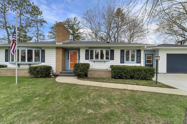 ranch-style house with driveway, a chimney, a front yard, and a garage