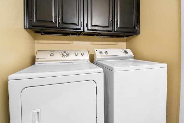 2 Oak Glen Ct, Madison, WI 53717 - laundry room featuring washer and dryer and cabinet space
