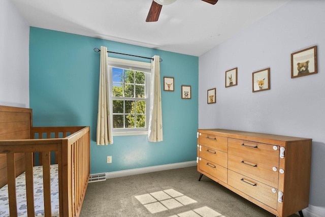 2 Oak Glen Ct, Madison, WI 53717 - carpeted bedroom with a nursery area, baseboards, and a ceiling fan