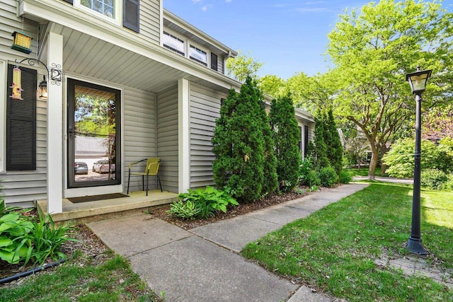 2 Oak Glen Ct, Madison, WI 53717 - property entrance featuring a lawn