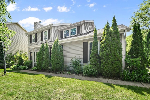 2 Oak Glen Ct, Madison, WI 53717 - view of front of property with a front lawn and a chimney