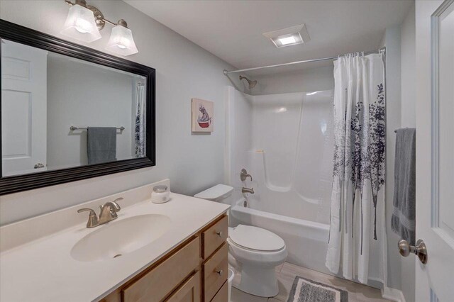 4062 Red Hawk Run, Black Earth, WI 53515 - bathroom featuring toilet, shower / bathtub combination with curtain, and vanity