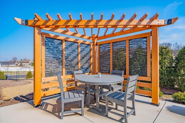 4062 Red Hawk Run, Black Earth, WI 53515 - view of patio / terrace featuring outdoor dining space and a pergola