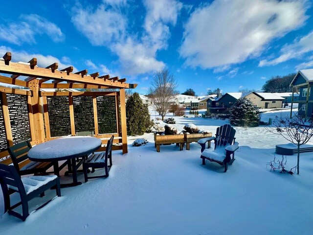 4062 Red Hawk Run, Black Earth, WI 53515 - yard covered in snow with a pergola
