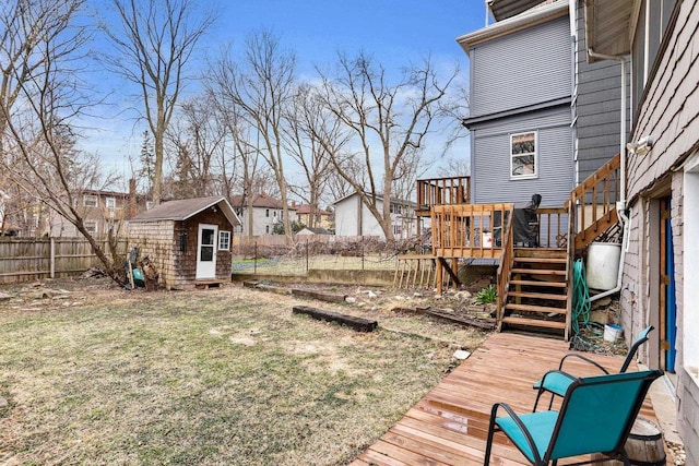1015 E Johnson St, Madison, WI 53703 - view of yard with a deck, a shed, a fenced backyard, an outbuilding, and a residential view