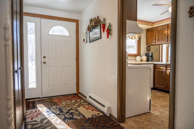 W5384 25th St, Necedah, WI 54646 - foyer entrance with baseboard heating and a ceiling fan
