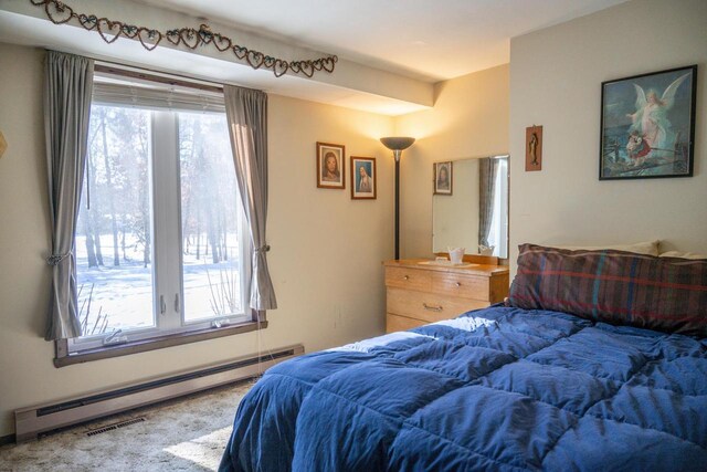 W5384 25th St, Necedah, WI 54646 - bedroom featuring a baseboard radiator