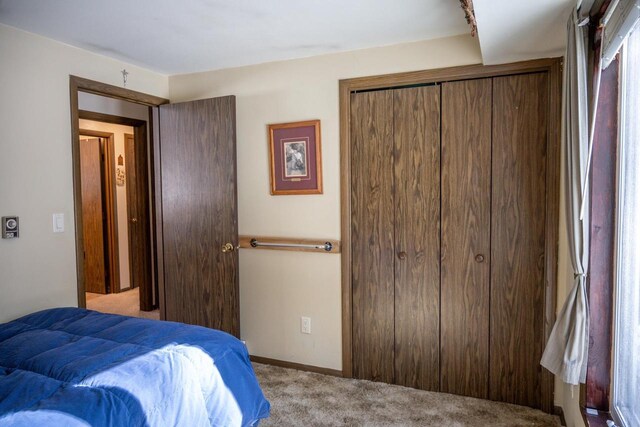 W5384 25th St, Necedah, WI 54646 - carpeted bedroom with a closet and baseboards