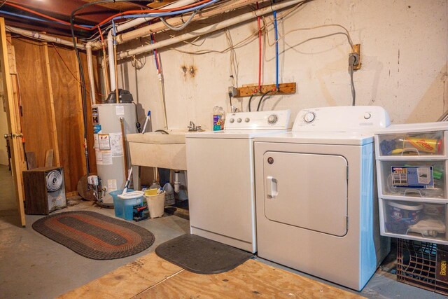 W5384 25th St, Necedah, WI 54646 - laundry area with independent washer and dryer, laundry area, and gas water heater