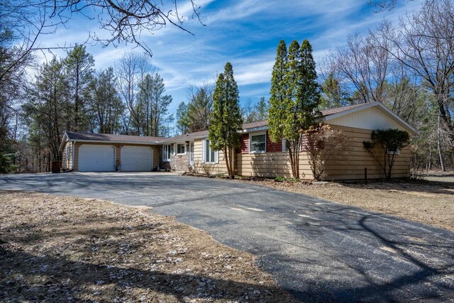 W5384 25th St, Necedah, WI 54646 - ranch-style house featuring a garage and aphalt driveway