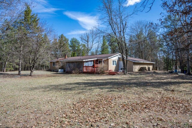 W5384 25th St, Necedah, WI 54646 - exterior space featuring a front yard and a chimney