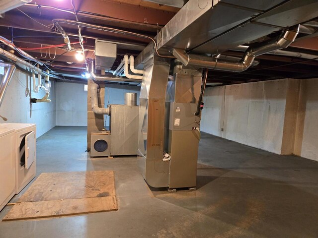 W5384 25th St, Necedah, WI 54646 - unfinished basement with washing machine and clothes dryer and heating unit