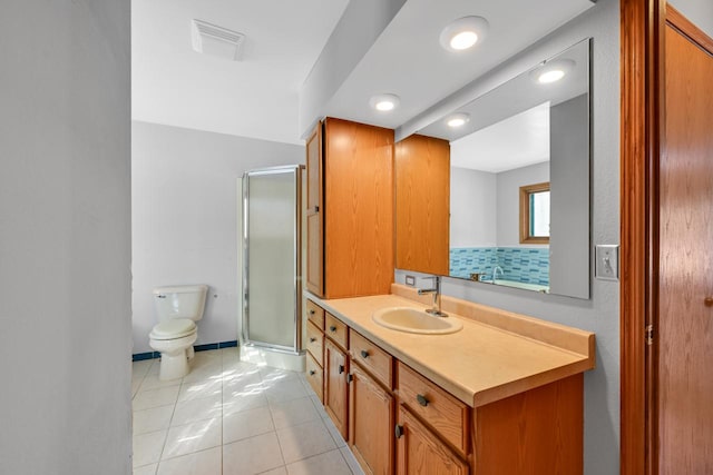 29323 Riverview Ln, Waterford, WI 53185 - bathroom featuring a shower stall, vanity, tile patterned flooring, visible vents, and toilet