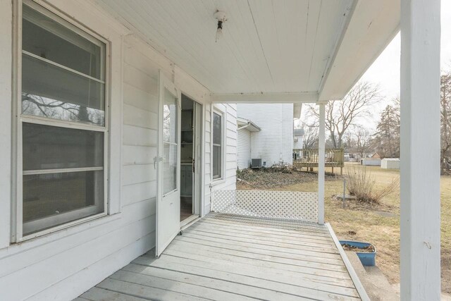deck featuring central air condition unit