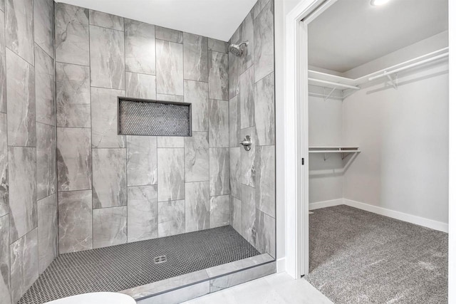 1377 Shelby Ln, De Pere, WI 54115 - full bath featuring toilet, a stall shower, baseboards, and a walk in closet
