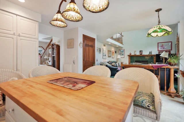 4530 Bleser Ct, Manitowoc, WI 54220 - dining space featuring recessed lighting, stairway, and a notable chandelier