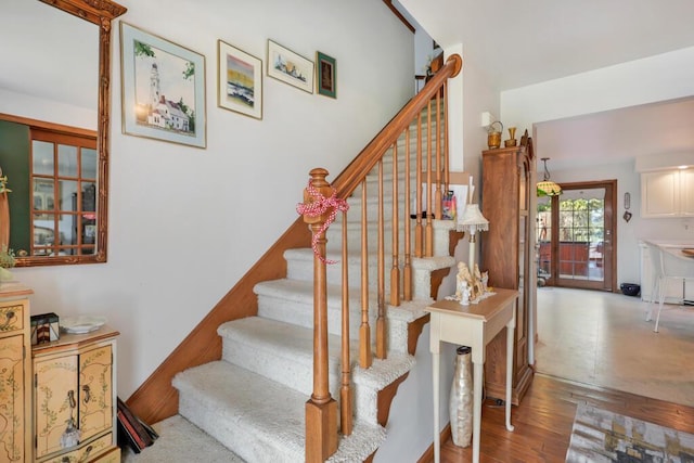 4530 Bleser Ct, Manitowoc, WI 54220 - stairs featuring wood finished floors