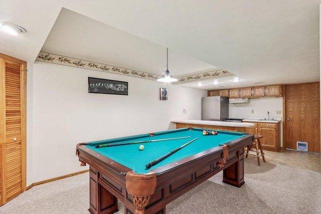 recreation room with a sink, wet bar, light colored carpet, and pool table