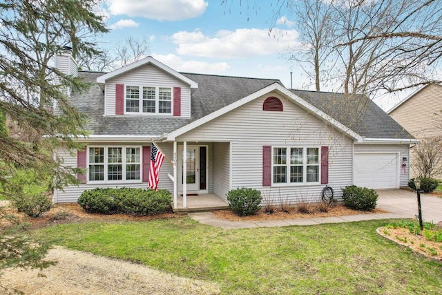 view of front of property with a porch, a front yard, a chimney, concrete driveway, and an attached garage