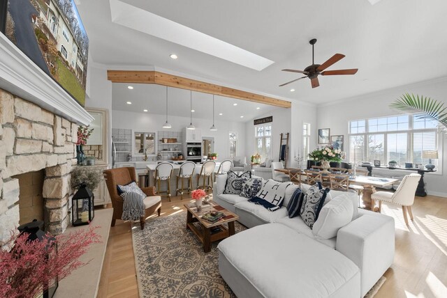1066 Edinborough Ct, Lake Geneva, WI 53147 - living area featuring a skylight, light wood-style floors, a ceiling fan, and recessed lighting