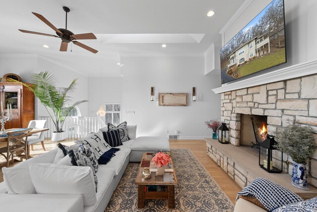 1066 Edinborough Ct, Lake Geneva, WI 53147 - living room featuring visible vents, ceiling fan, light wood-style floors, a fireplace, and recessed lighting