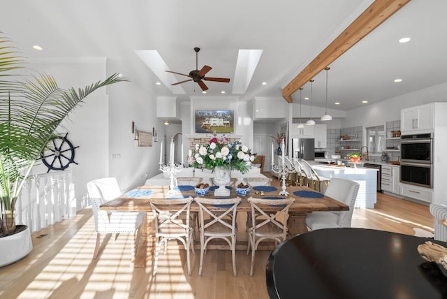 1066 Edinborough Ct, Lake Geneva, WI 53147 - dining space with a skylight, light wood finished floors, and ceiling fan