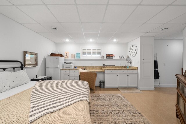 1066 Edinborough Ct, Lake Geneva, WI 53147 - bedroom with freestanding refrigerator, a drop ceiling, visible vents, and recessed lighting