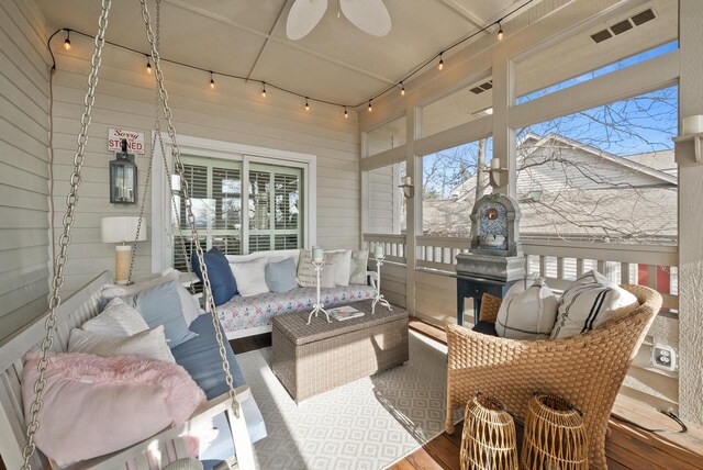 1066 Edinborough Ct, Lake Geneva, WI 53147 - sunroom with visible vents, outdoor lounge area, rail lighting, and plenty of natural light
