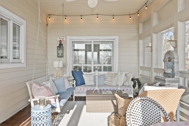 1066 Edinborough Ct, Lake Geneva, WI 53147 - sunroom featuring an outdoor hangout area and rail lighting