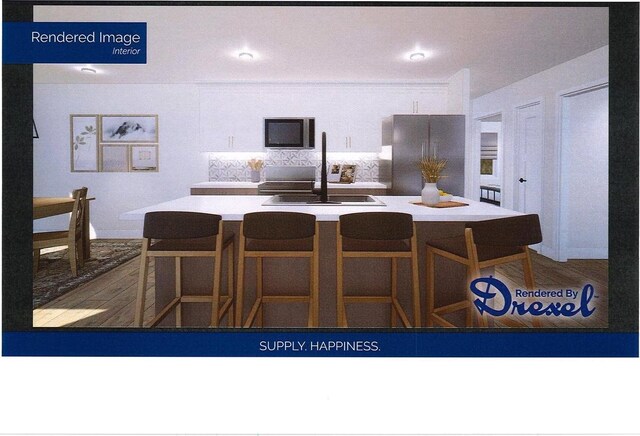 LOT3CSM7857 Hall St, Ripon, WI 54971 - kitchen featuring recessed lighting, light countertops, freestanding refrigerator, a center island with sink, and a sink