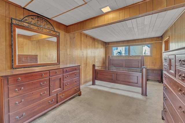 12606 234th Ave, Trevor, WI 53179 - bedroom with wooden walls and light carpet