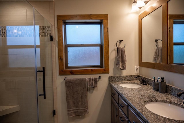W5677 N Stone Gate Dr, New Lisbon, WI 53950 - bathroom with a sink, double vanity, and a stall shower