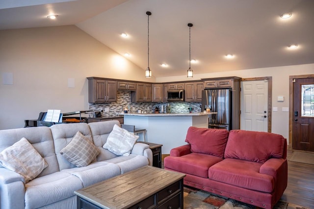 W5677 N Stone Gate Dr, New Lisbon, WI 53950 - living room with dark wood-type flooring and vaulted ceiling