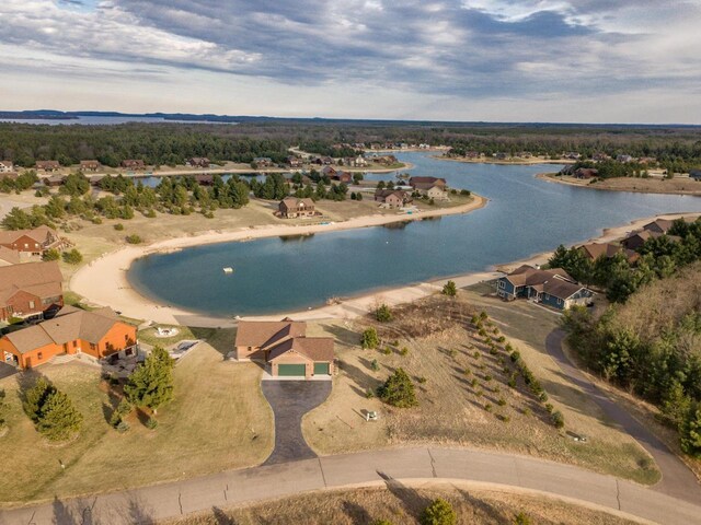 W5677 N Stone Gate Dr, New Lisbon, WI 53950 - bird's eye view featuring a water view and a residential view