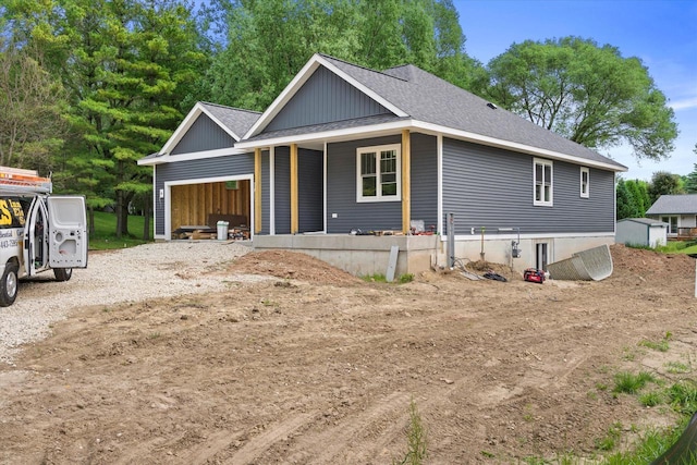 LT2 Steeple View Rd, West Bend, WI 53095 - view of front of home featuring an attached garage and roof with shingles