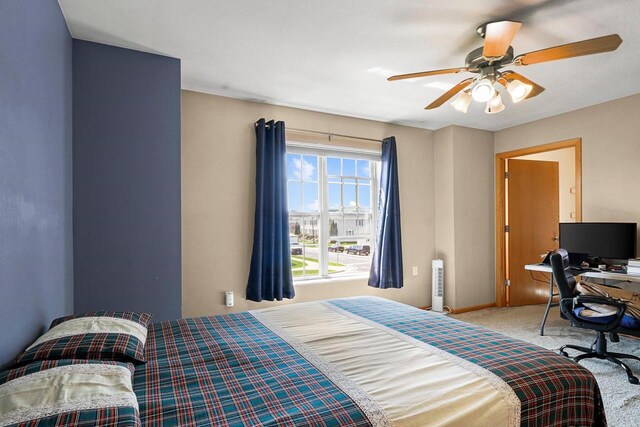 bedroom with carpet flooring, ceiling fan, and baseboards