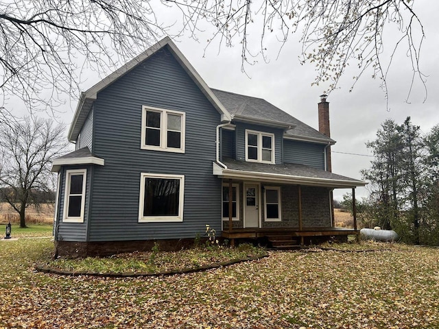 5169 Kratz Rd, Omro, WI 54963 - view of front of home with a chimney and covered porch
