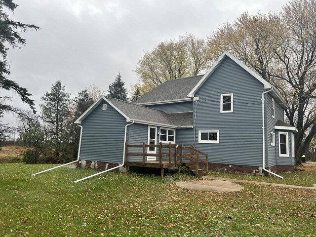 5169 Kratz Rd, Omro, WI 54963 - back of property featuring a wooden deck, a lawn, and roof with shingles