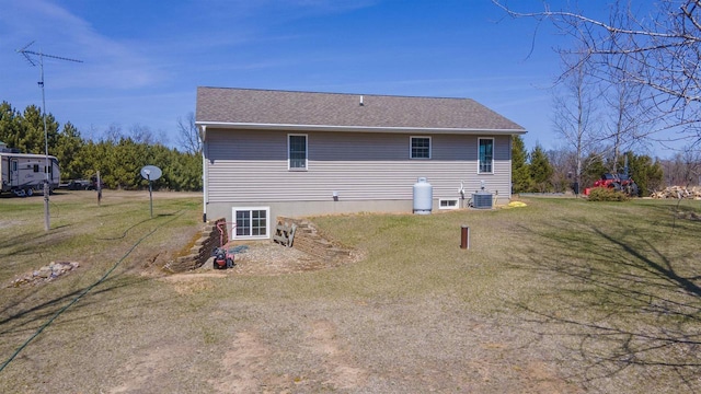N302 24th Ave, Neshkoro, WI 54960 - rear view of property with a yard and central AC