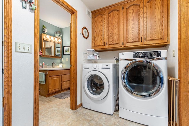 101 Brookview Pl, Combined Locks, WI 54113 - laundry area with washing machine and clothes dryer and cabinet space