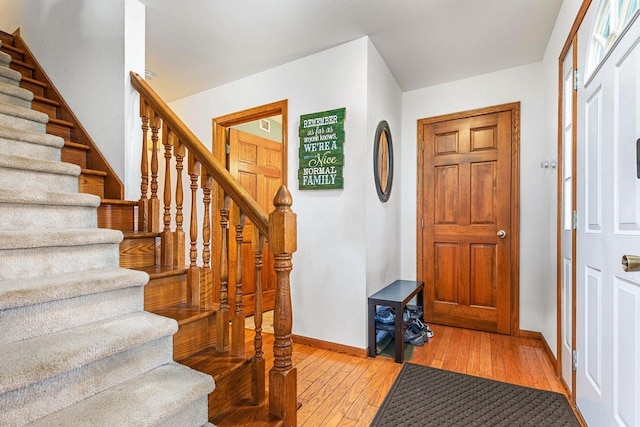 101 Brookview Pl, Combined Locks, WI 54113 - entrance foyer featuring light wood-style flooring and stairway