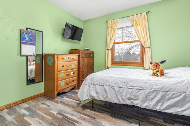 101 Brookview Pl, Combined Locks, WI 54113 - bedroom featuring wood finished floors and baseboards